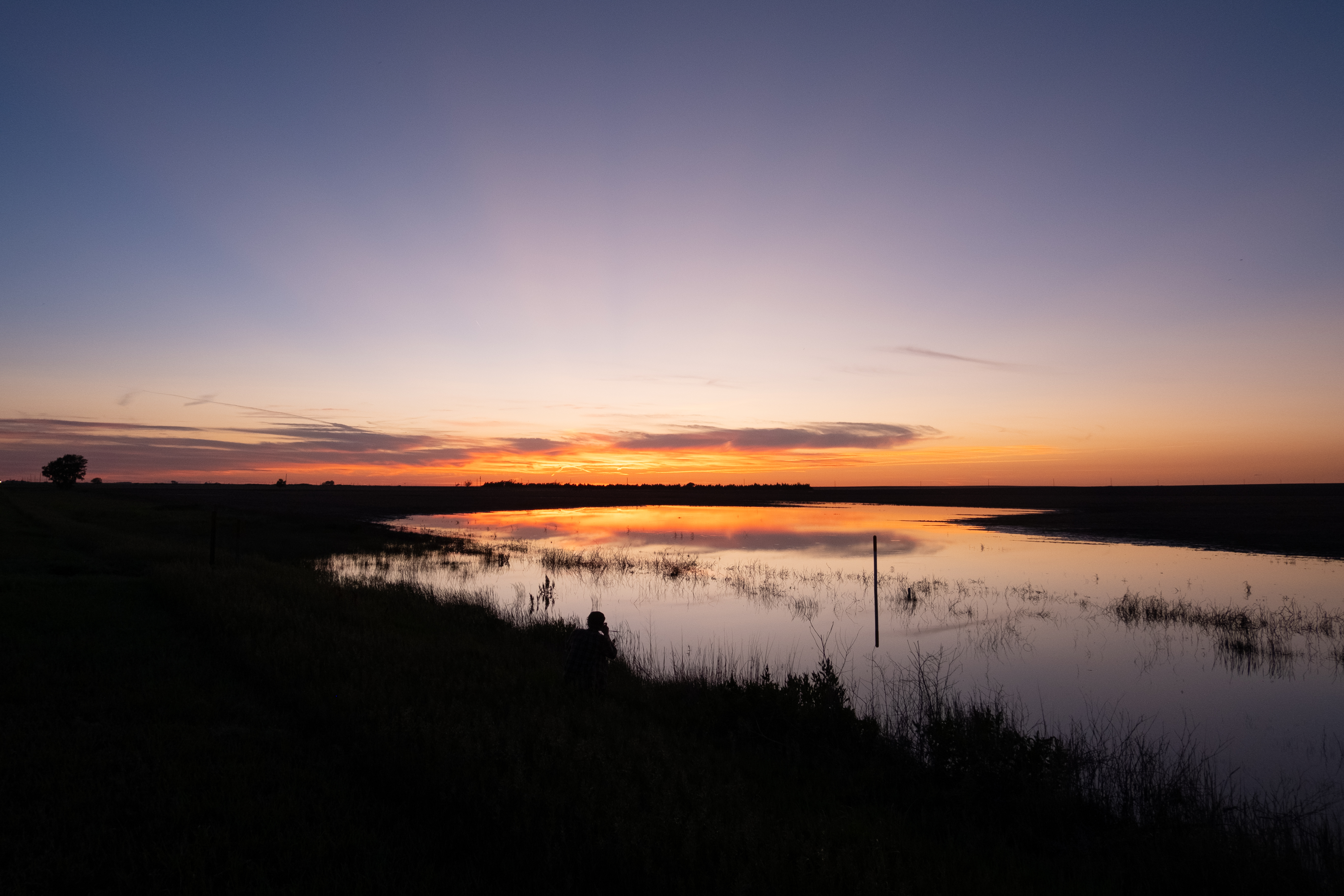 Sunset over lake banner image